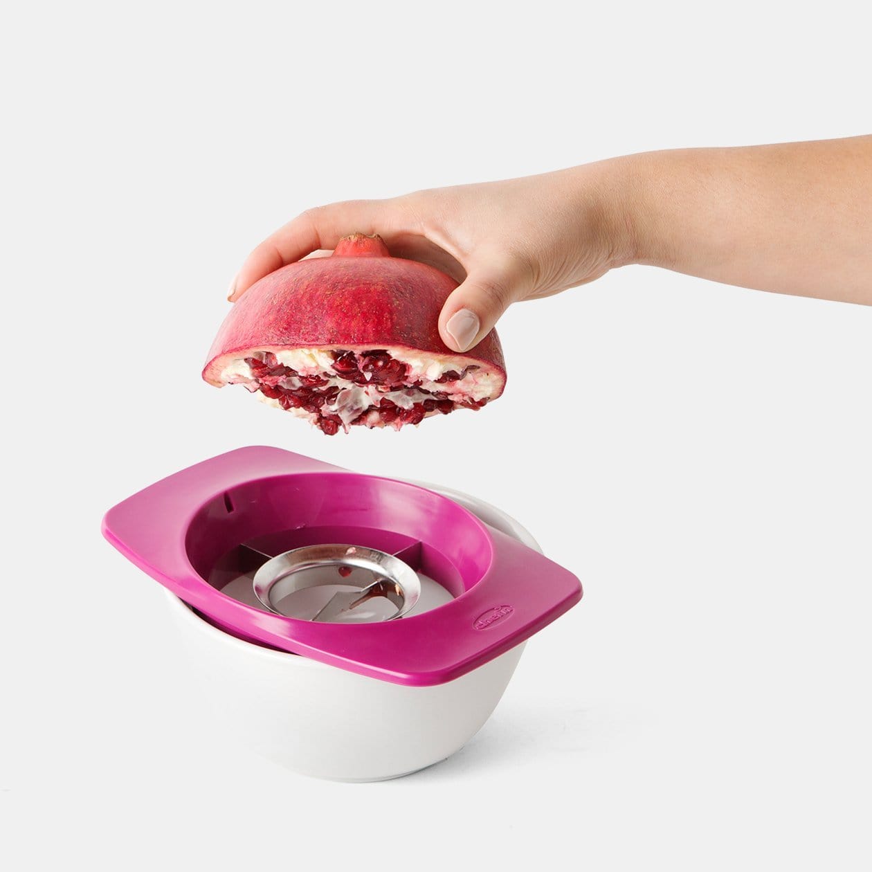 http://www.chefn.com/cdn/shop/files/chef-n-slicester-pomegranate-prep-tool-102-006-005-16030156259468.jpg?v=1699405482